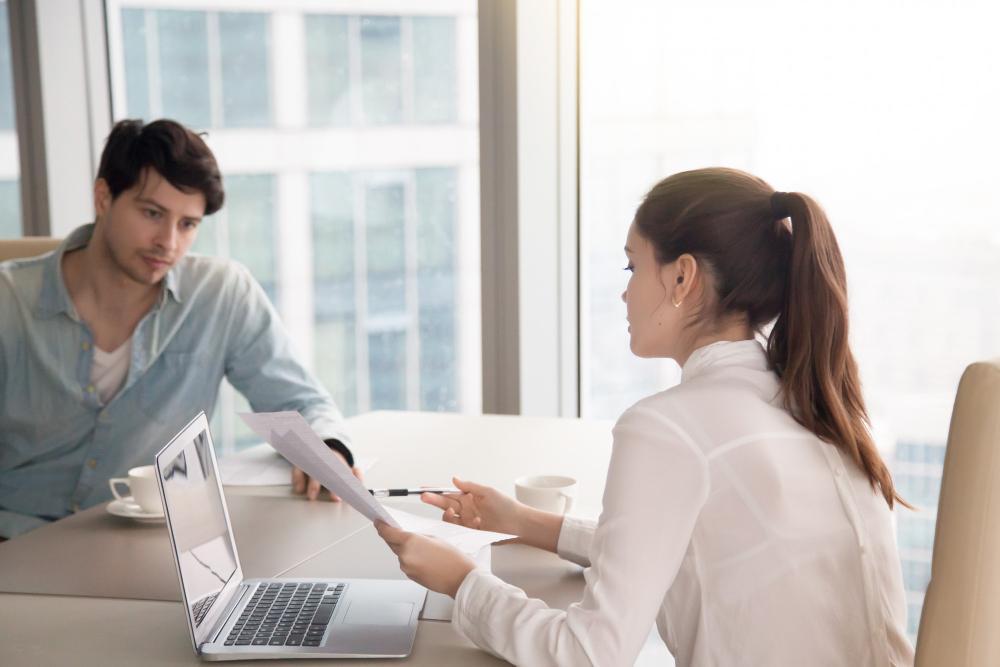 Dependant's Pass holder discussing Singapore PR pathways with an immigration consultant